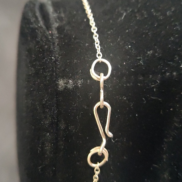 Silver color necklace unclip is 20 inch long, close is 9 1/2 inch long. - Picture 4 of 5